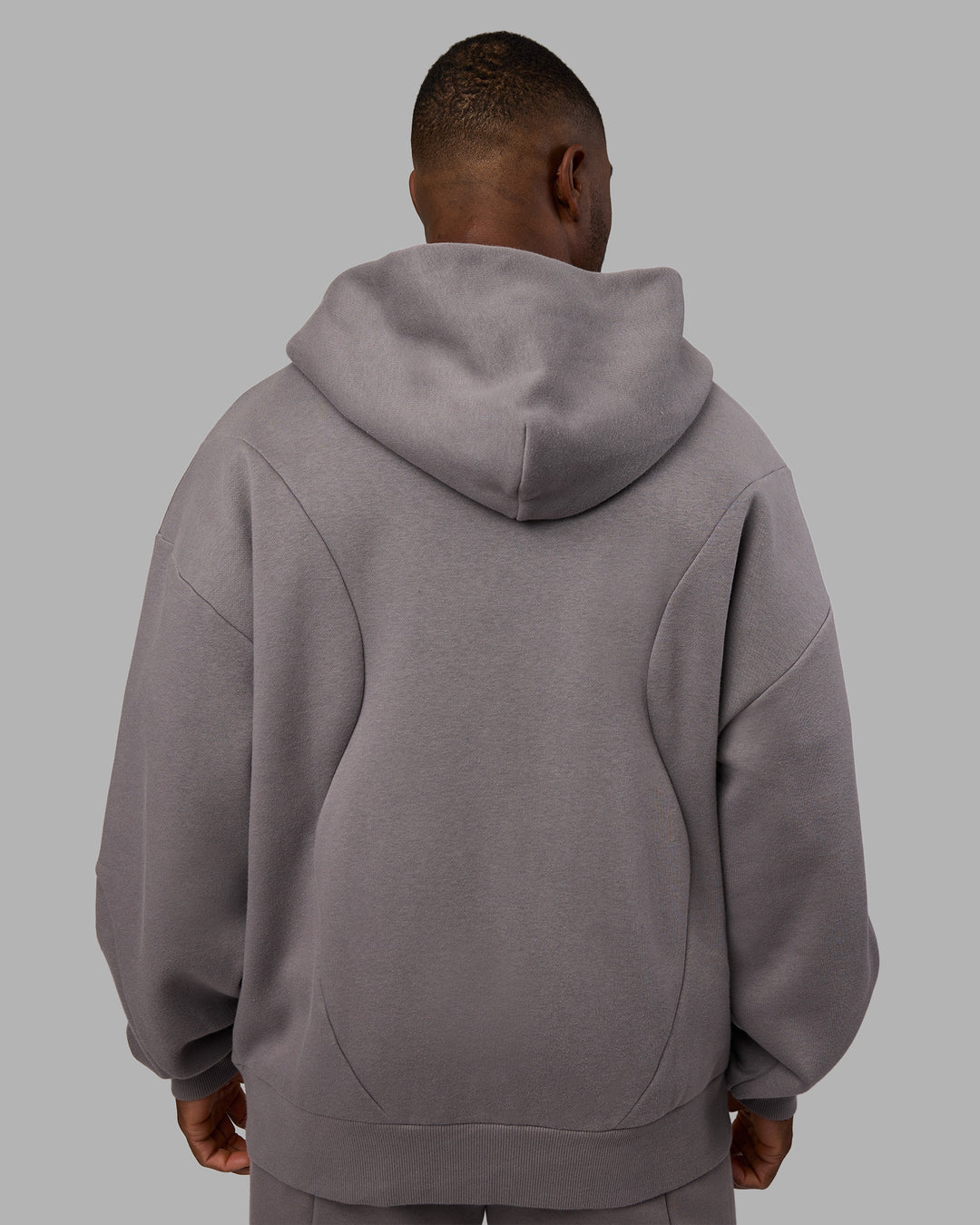 Man wearing Stream Oversized Panel Zip Hoodie - Storm Front | Model:Sam | Size:L