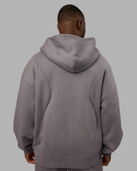 Man wearing Stream Oversized Panel Zip Hoodie - Storm Front | Model:Sam | Size:L