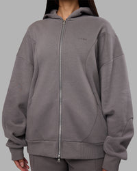 Woman wearing Stream Oversized Panel Zip Hoodie - Storm Front | Model:Rhiley | Size:L
