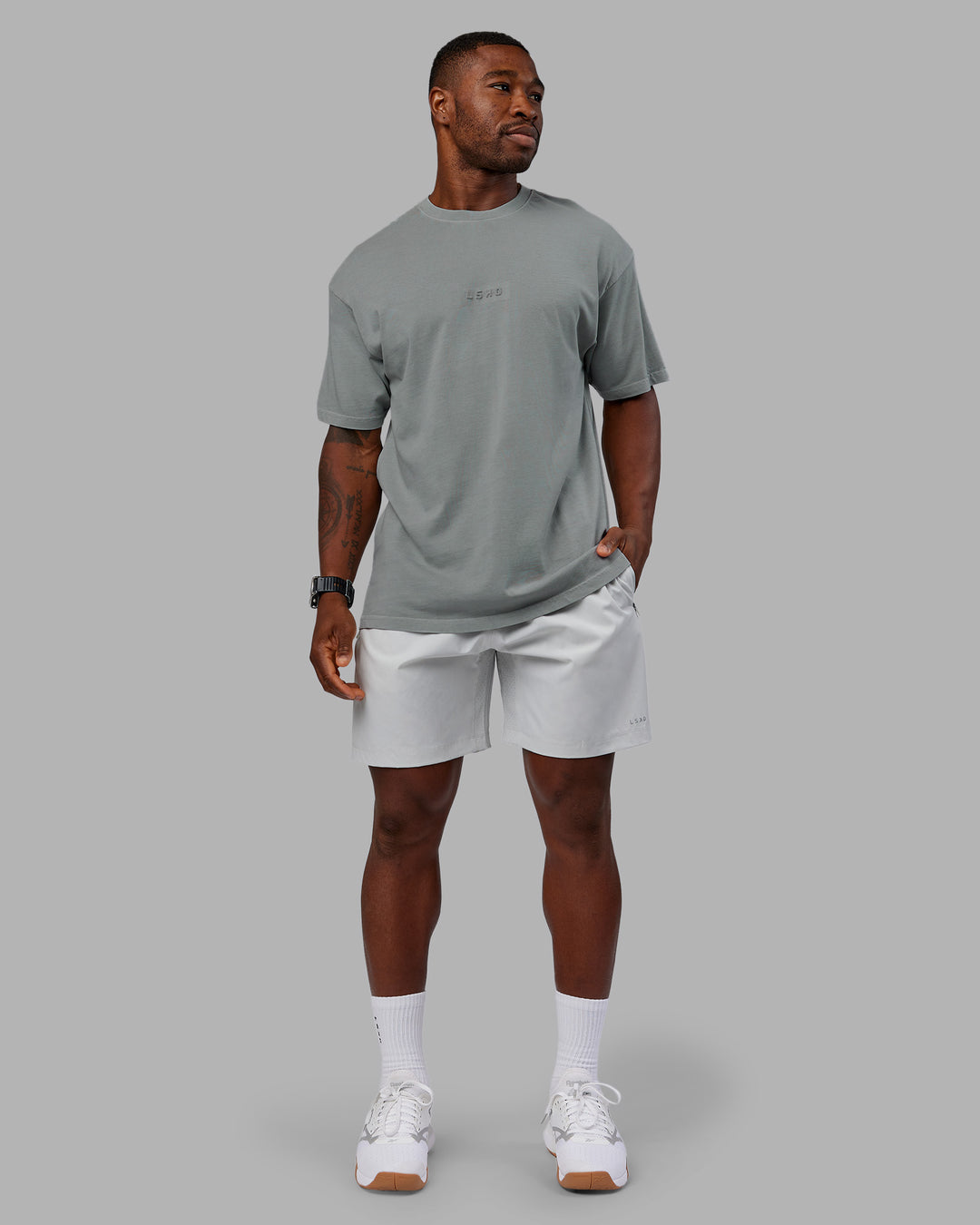 Man wearing Stream Washed Heavyweight Oversized Tee - Washed Circular Grey | Model:Sam | Size:L