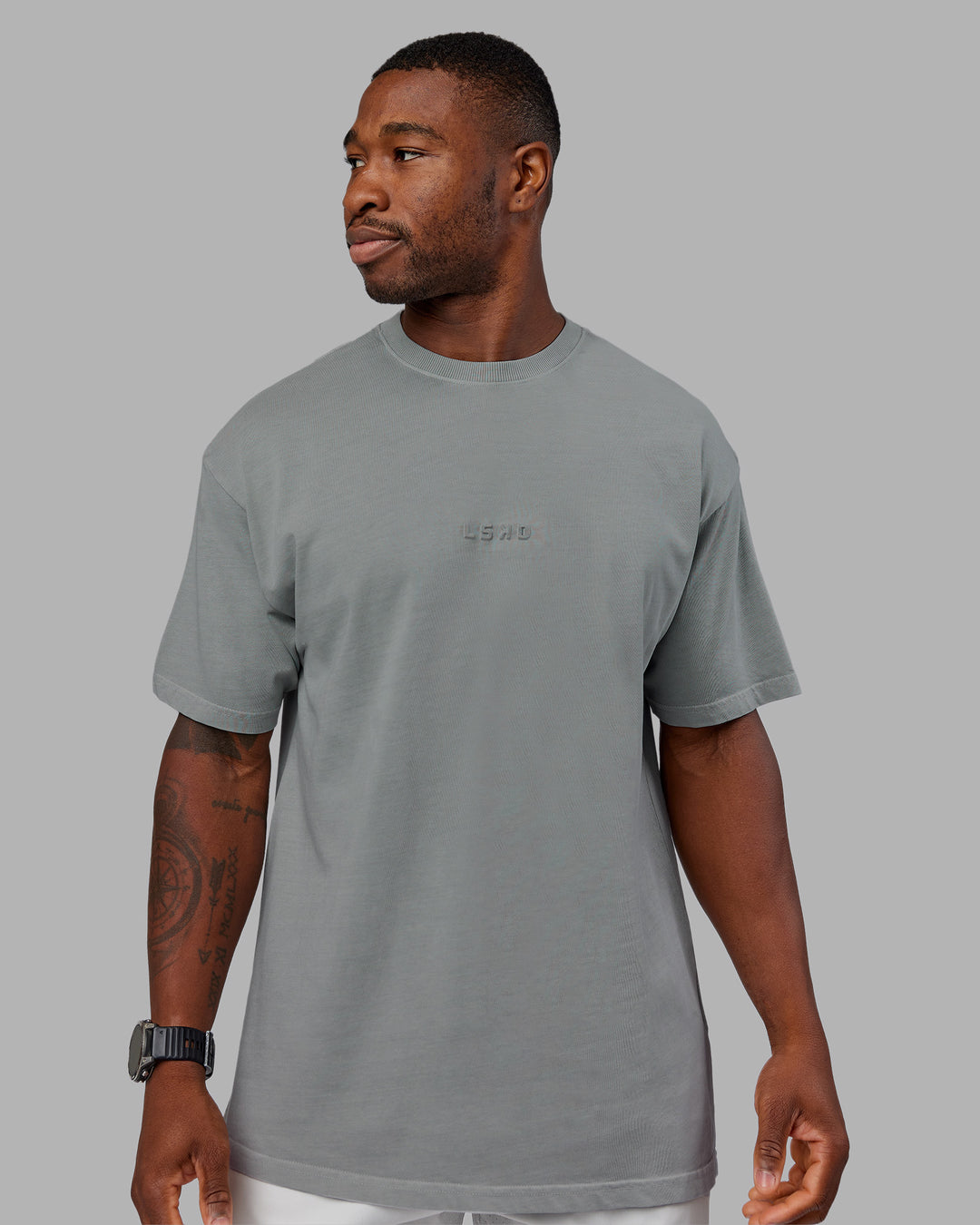 Man wearing Stream Washed Heavyweight Oversized Tee - Washed Circular Grey | Model:Sam | Size:L
