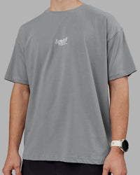 Man wearing Time's Up Heavyweight Oversized Tee - Circular Grey-White | Model:Tom | Size:L