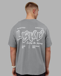 Man wearing Time's Up Heavyweight Oversized Tee - Circular Grey-White | Model:Tom | Size:L