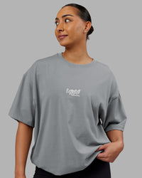 Woman wearing Time's Up Heavyweight Oversized Tee - Circular Grey-White | Model:Ayla | Size:L