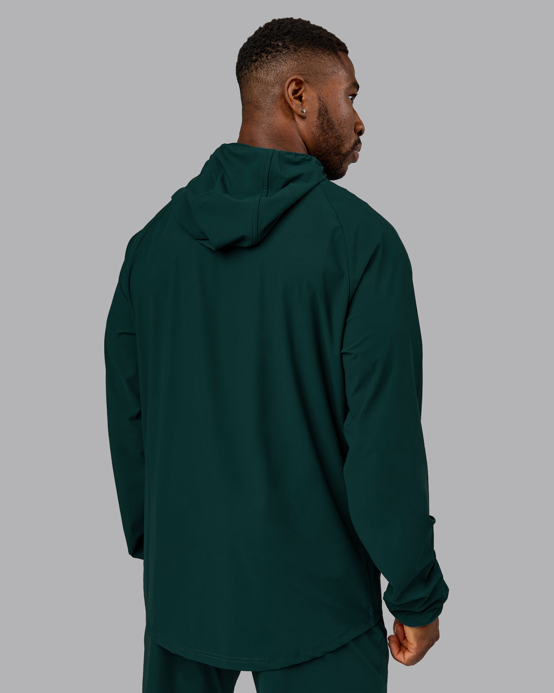 Man wearing Train-Lite FLXMAX Jacket - Dark Moss | Model:Sam | Size:L