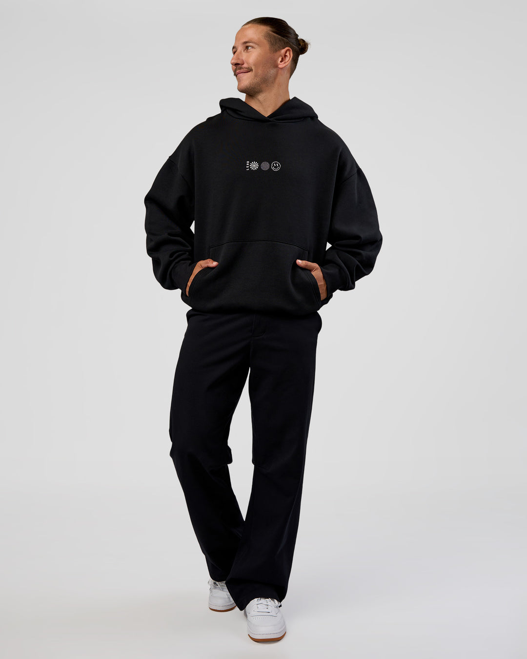 Man wearing Trust The Process Unisex Oversized Hoodie - Black-White | Model:Jaiden | Size:L