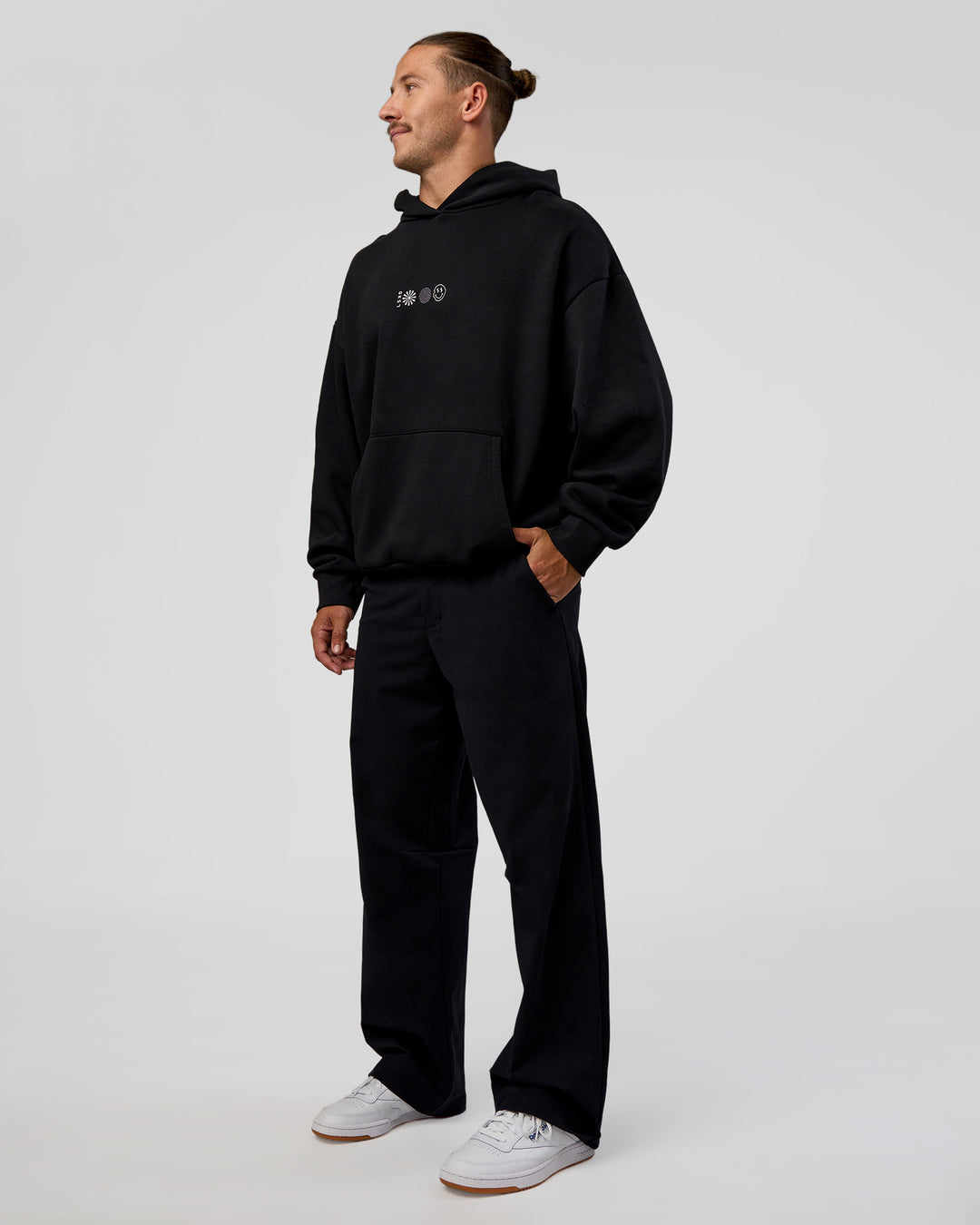Man wearing Trust The Process Unisex Oversized Hoodie - Black-White | Model:Jaiden | Size:L
