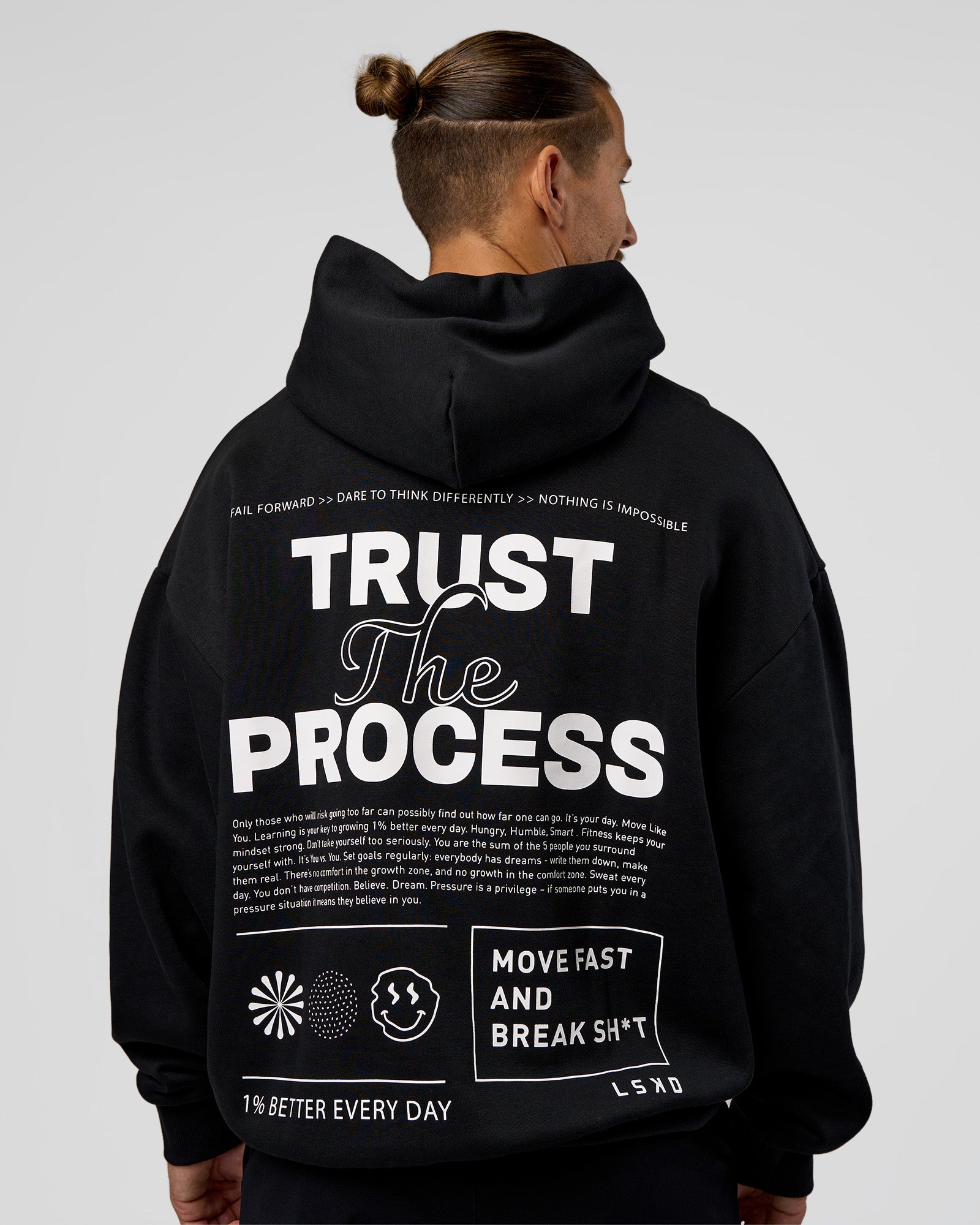 Man wearing Trust The Process Unisex Oversized Hoodie - Black-White | Model:Jaiden | Size:L
