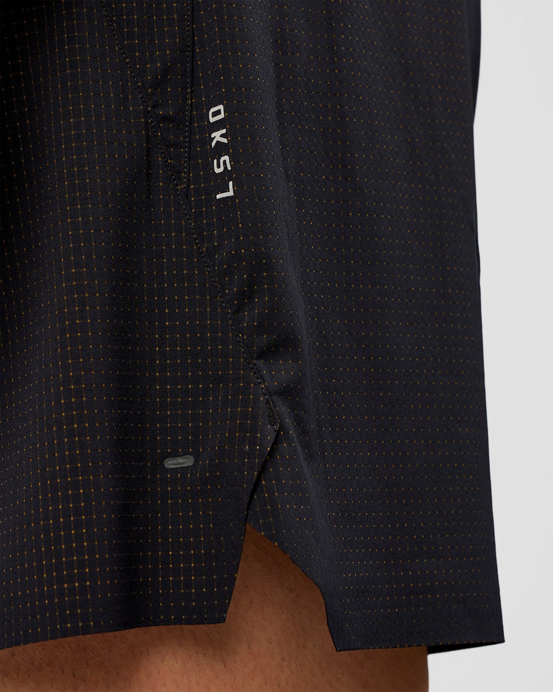 Man wearing UltraAir 5" Lined Performance Short  - Black-Reflective | Model:Liam | Size:L