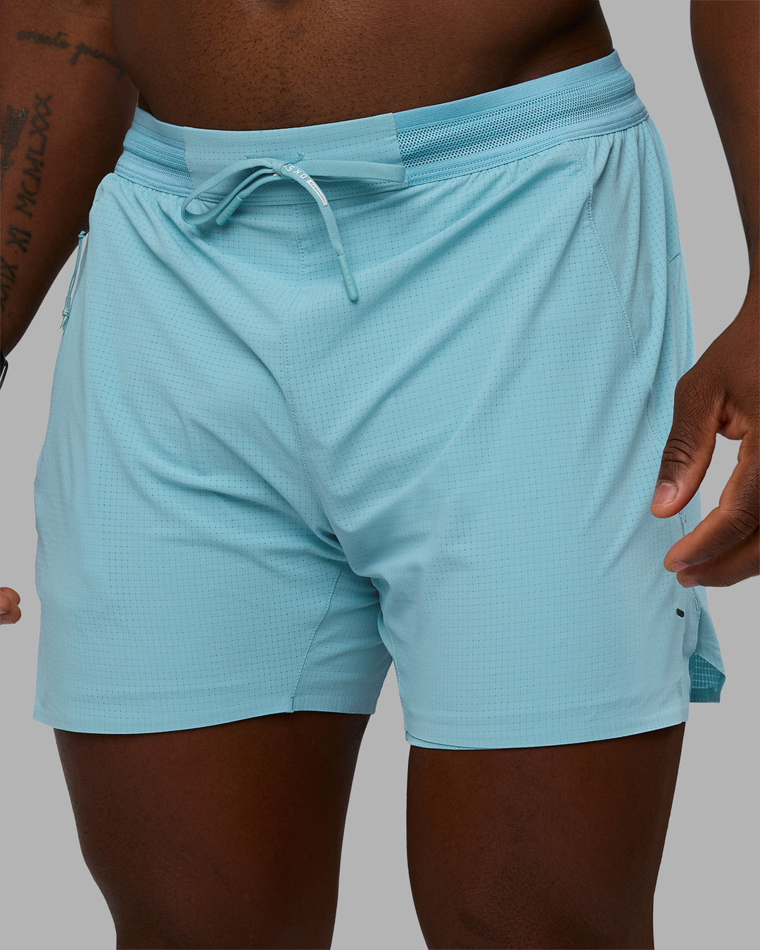 Man wearing UltraAir 5&quot; Lined Performance Short - Retro Blue | Model:Sam | Size:L