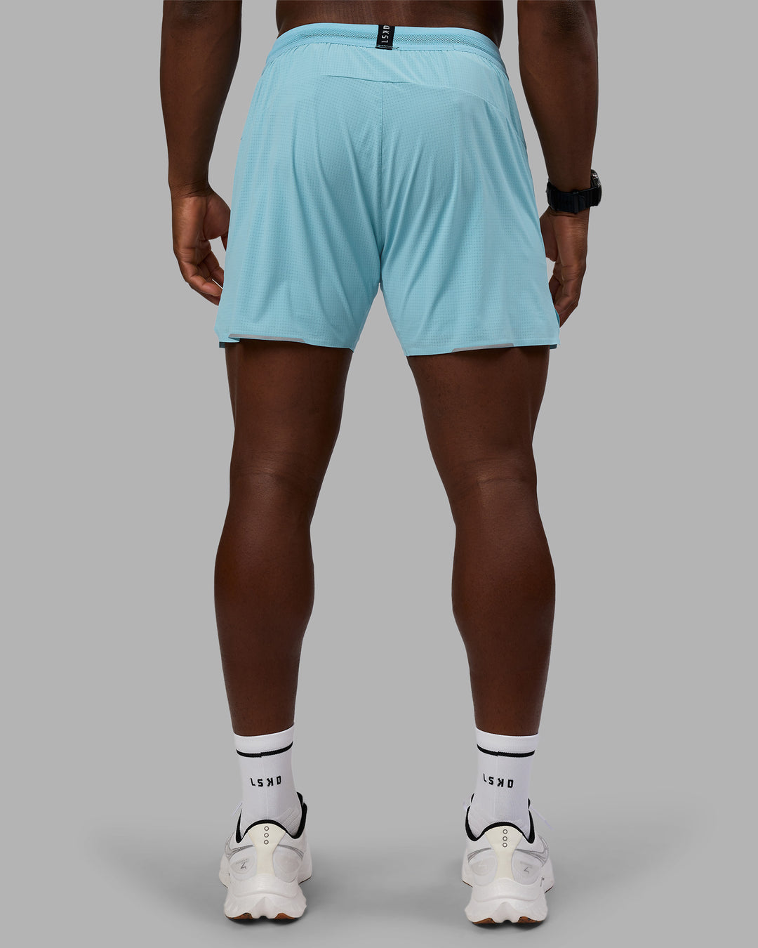Man wearing UltraAir 5&quot; Lined Performance Short - Retro Blue | Model:Sam | Size:L