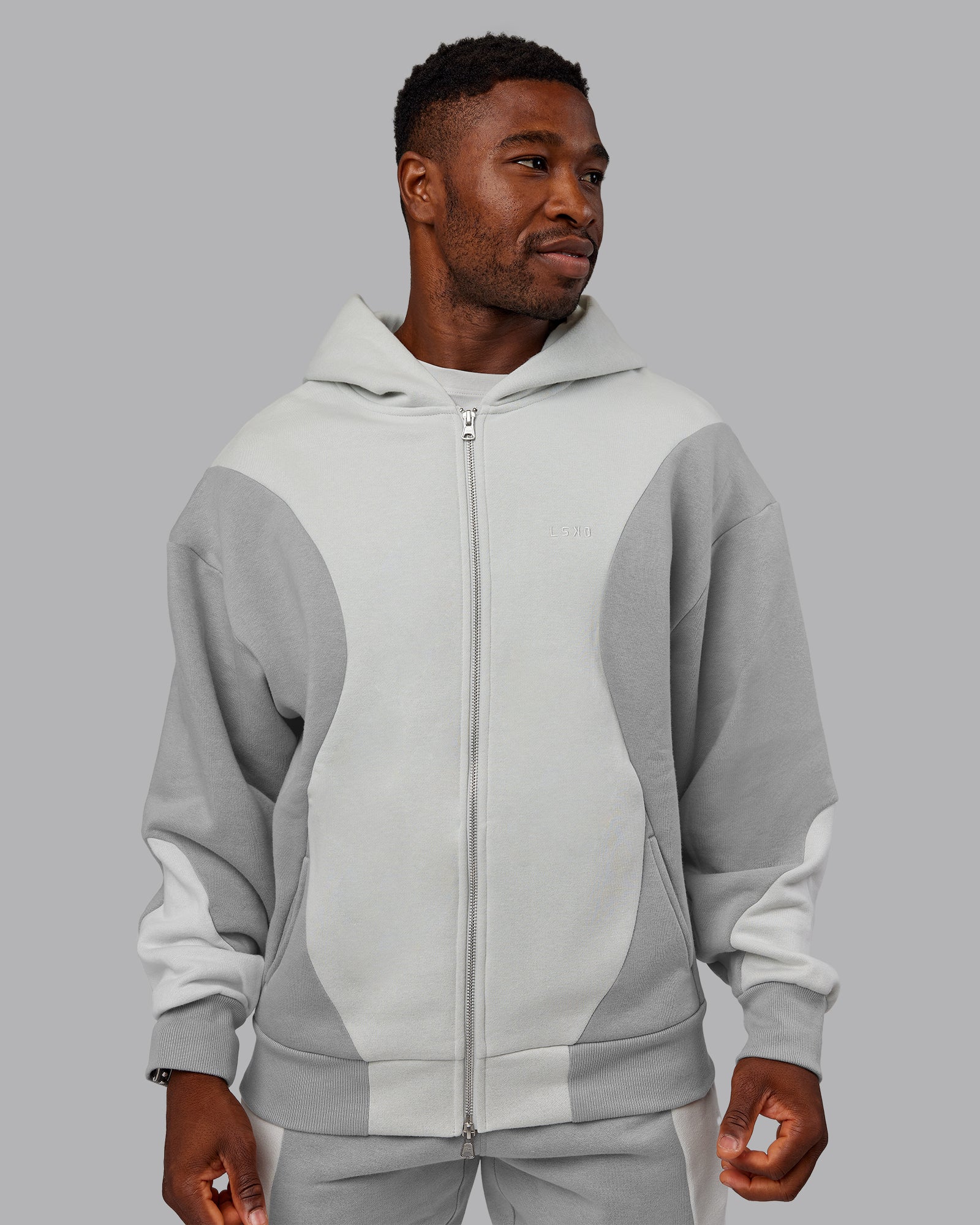 Man wearing Stream Oversized Panel Zip Hoodie - Circular Grey-Digital Mist | Model:Sam | Size:L