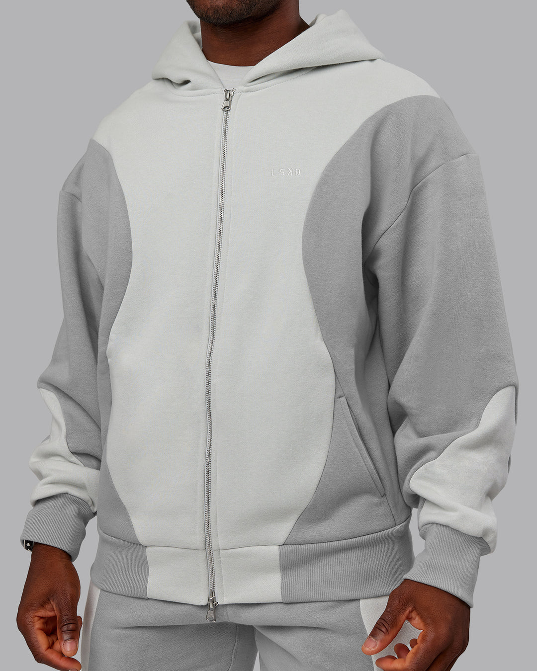 Man wearing Stream Oversized Panel Zip Hoodie - Circular Grey-Digital Mist | Model:Sam | Size:L