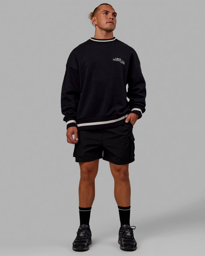 Man wearing Unisex Fitness Club Sweater Oversize - Black-Off White
