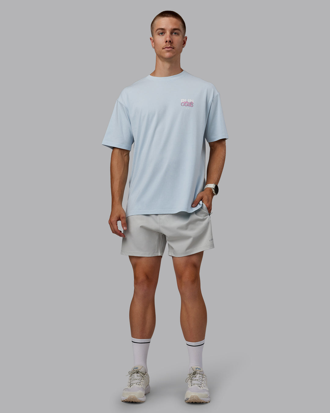 Man wearing Unisex Gone Running FLXCotton Tee Oversize - Skyride-Bubblegum - view 5