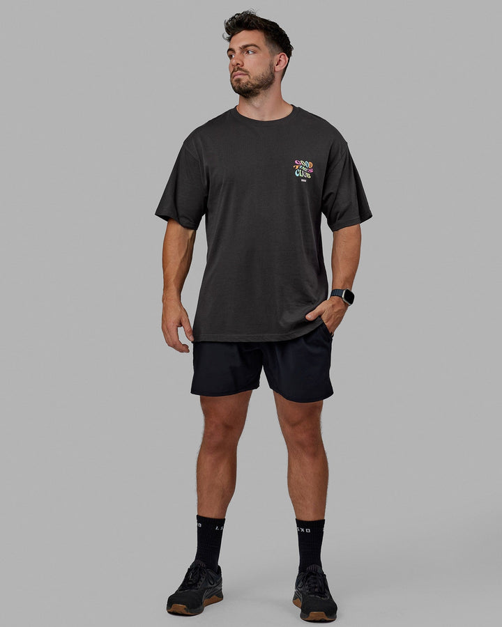 Man wearing Unisex Good Times Heavyweight Tee Oversize - Phantom-Multi