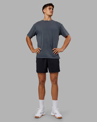Man wearing Lifting Club FLXCotton Tee Oversize - Dark Storm Washed-Blue | Model:Jackson | Size:L