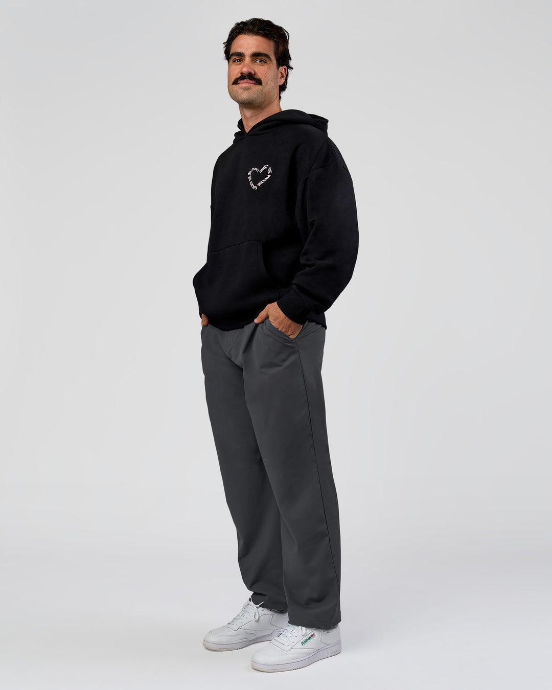 Man wearing Unisex Love The Process Oversize Hoodie - Black-Marshmallow | Model:Adam | Size:L