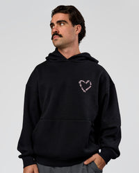 Man wearing Unisex Love The Process Oversize Hoodie - Black-Marshmallow | Model:Adam | Size:L