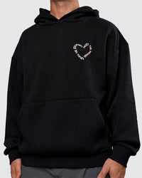 Man wearing Unisex Love The Process Oversize Hoodie - Black-Marshmallow | Model:Adam | Size:L