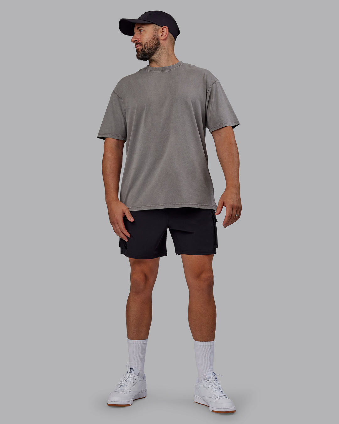 Man wearing Unisex Miami25 Washed FLXCotton Tee Oversize - Storm Front-Lemon Fizz