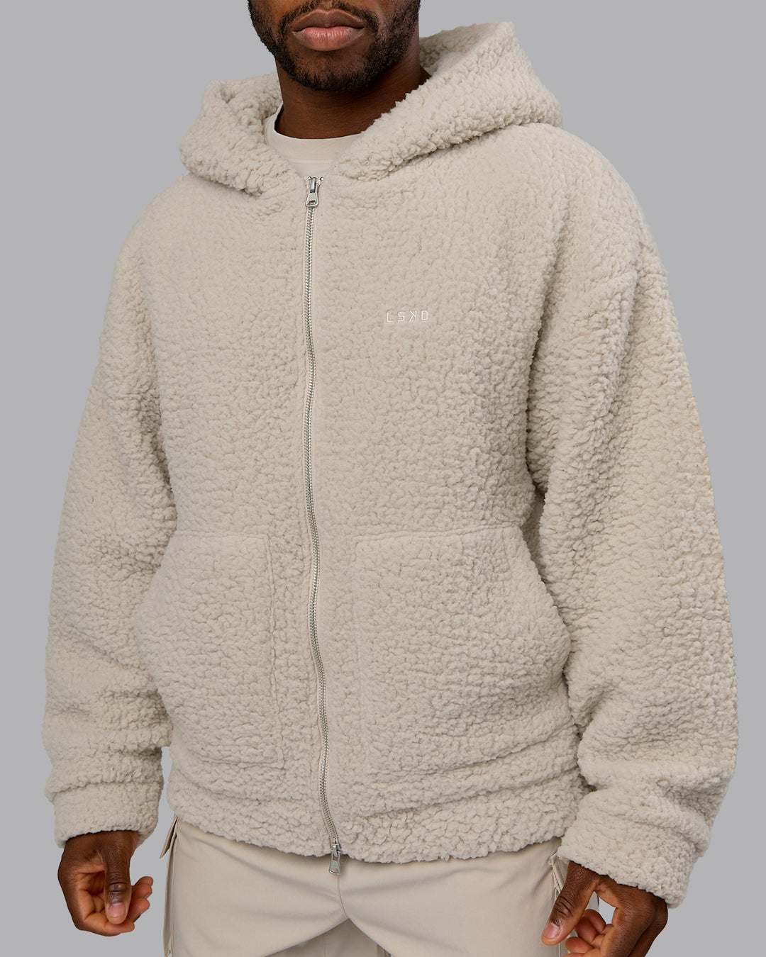Man wearing Sherpa Oversized Jacket - Shale Beige | Model:Sam | Size:L