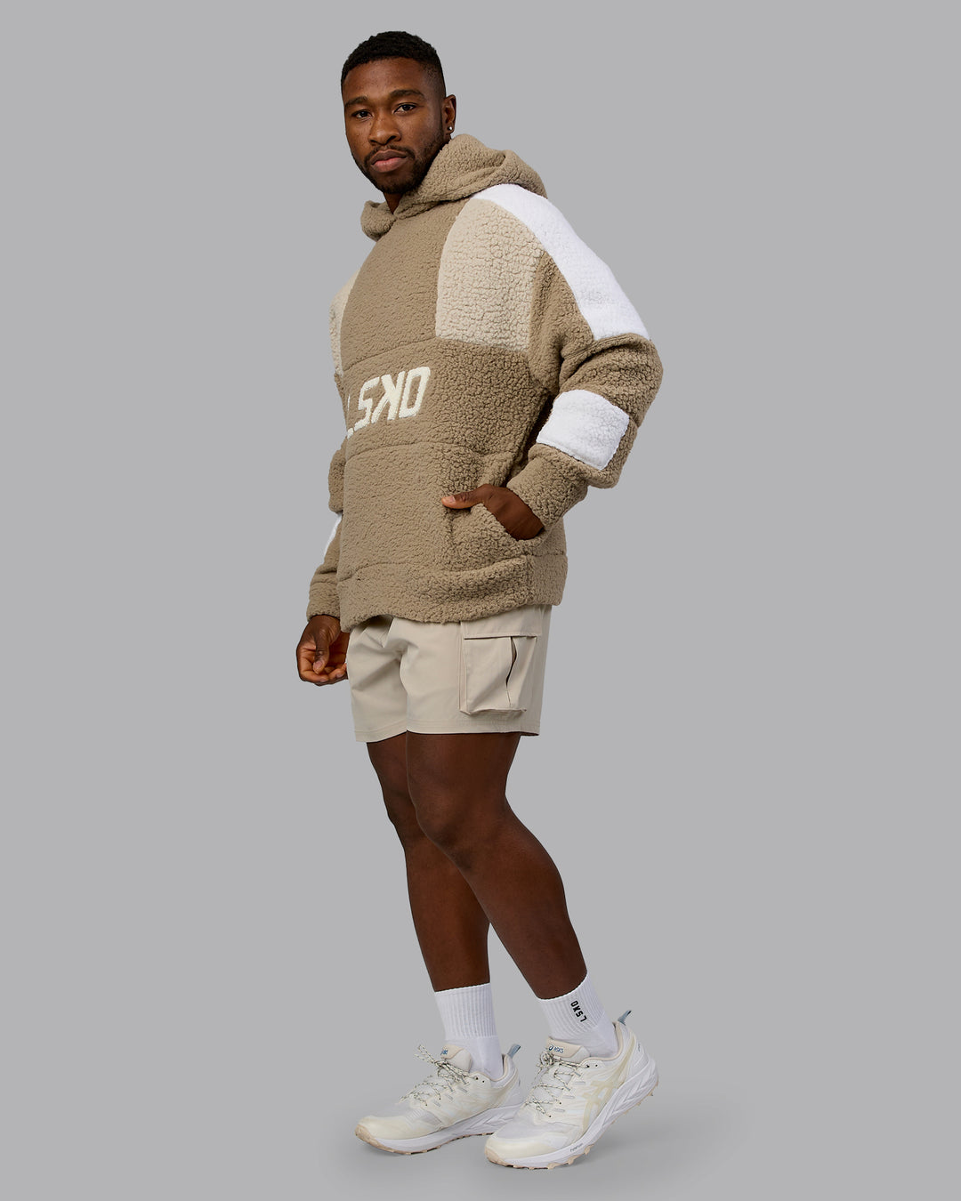 Man wearing Sherpa Slam Hoodie Oversized - Greige-Shale Beige-White | Model:Sam | Size:L