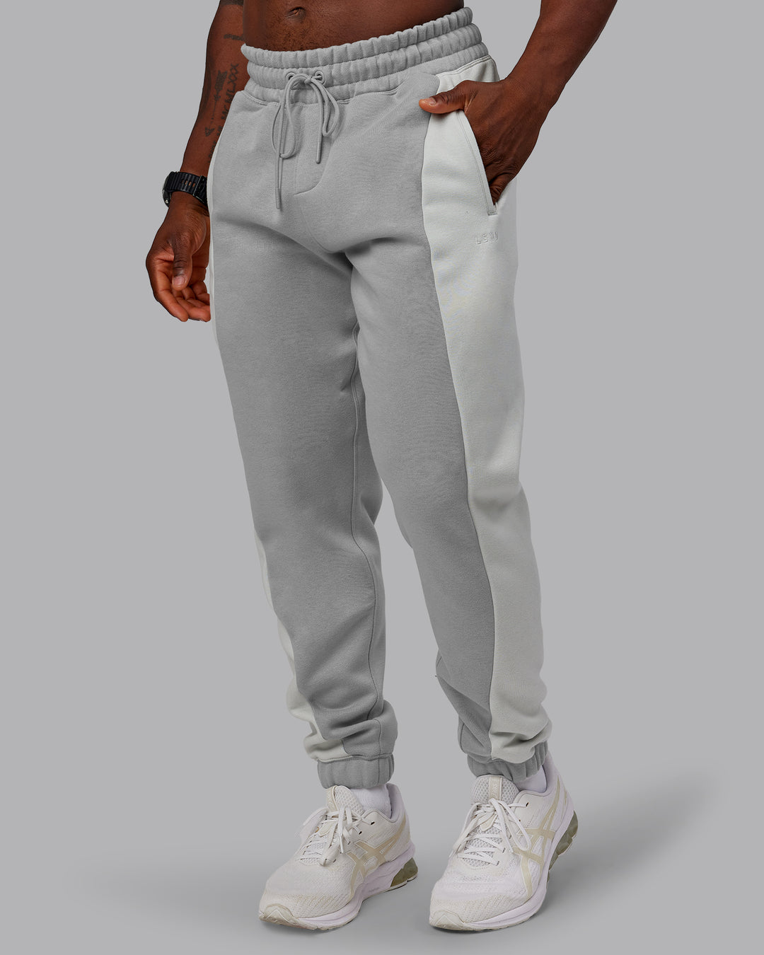 Man wearing Stream Panel Track Pants - Circular Grey-Digital Mist | Model:Sam | Size:L
