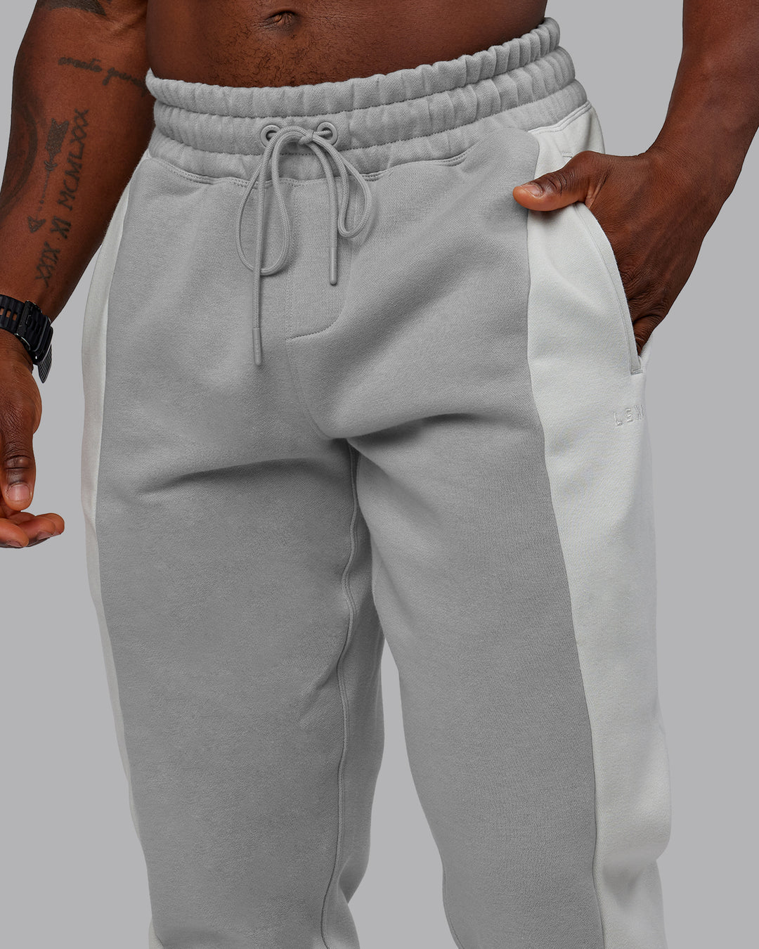 Man wearing Stream Panel Track Pants - Circular Grey-Digital Mist | Model:Sam | Size:L
