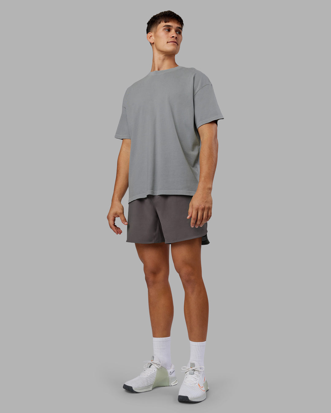 Man wearing Pressure Washed Heavyweight Oversize Tee - Grey-Bubblegum | Model:Jackson | Size:L
