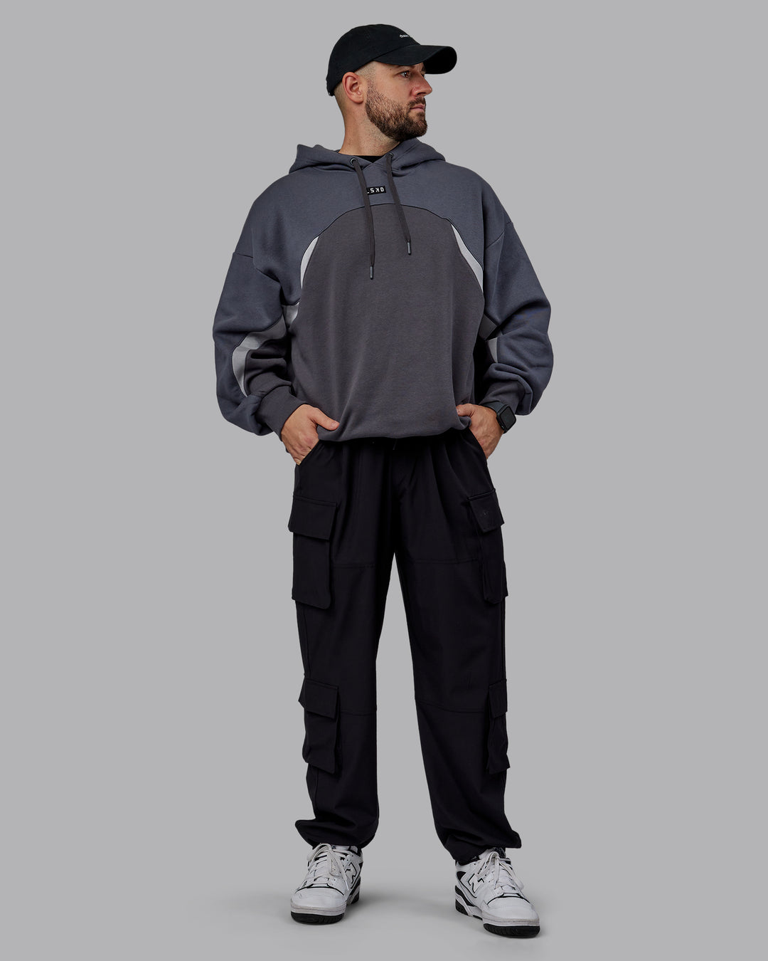 Man wearing Unisex Y2K Concept Panel Hoodie - Asphalt-Turbulance - view 8