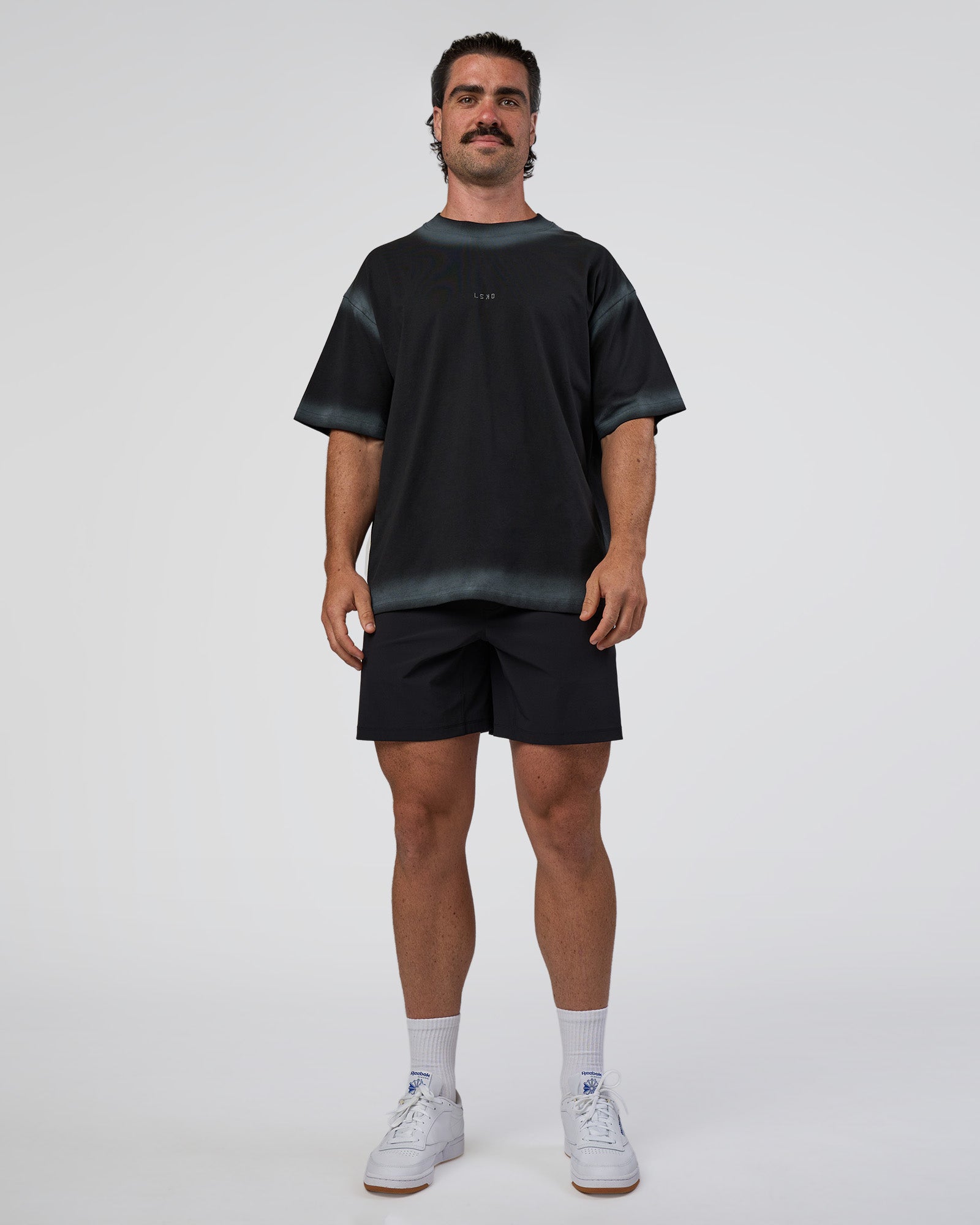 Man wearing Urban Blur Heavyweight Unisex Oversized Tee - Black-Dark Storm | Model:Adam | Size:L