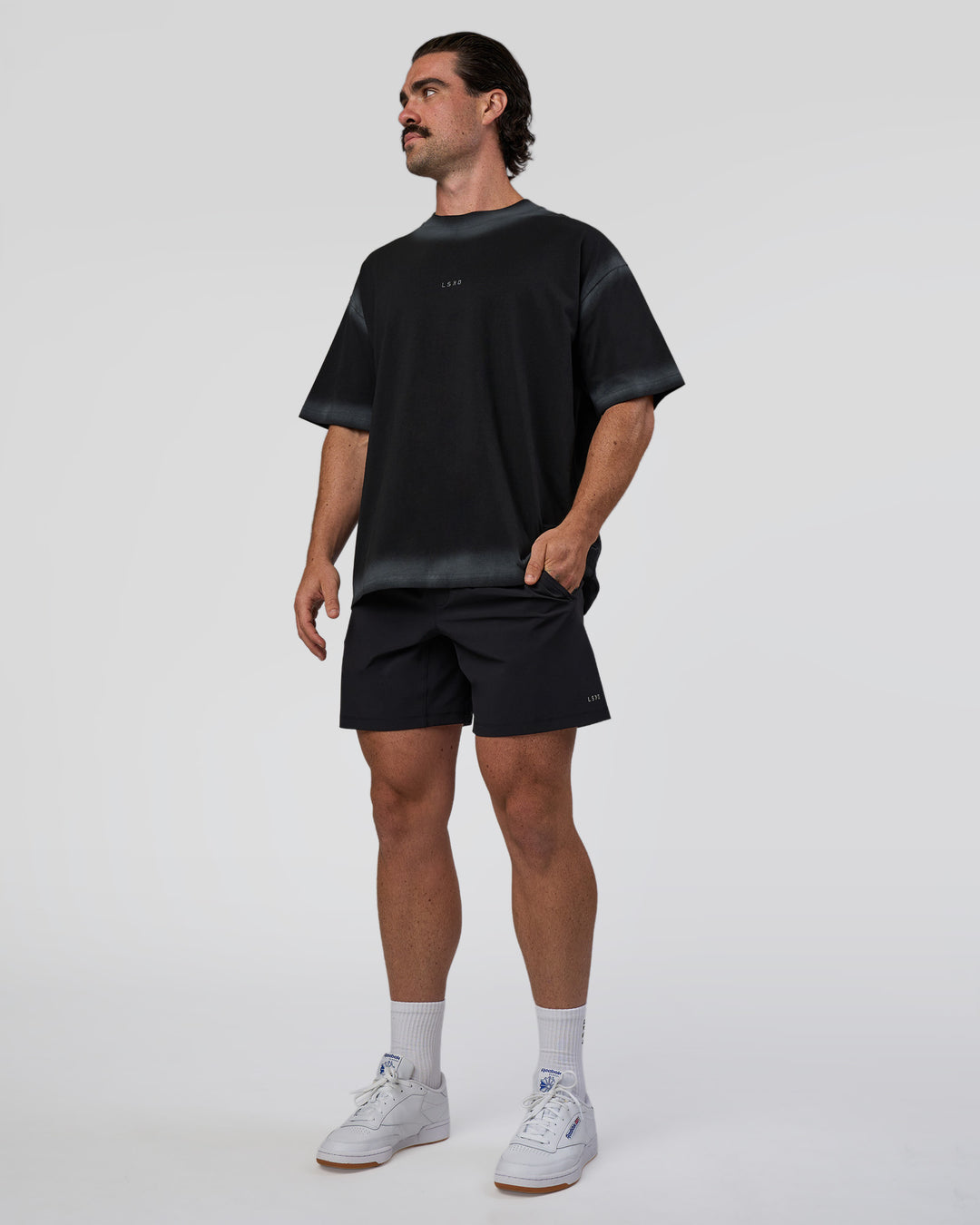 Man wearing Urban Blur Heavyweight Unisex Oversized Tee - Black-Dark Storm | Model:Adam | Size:L