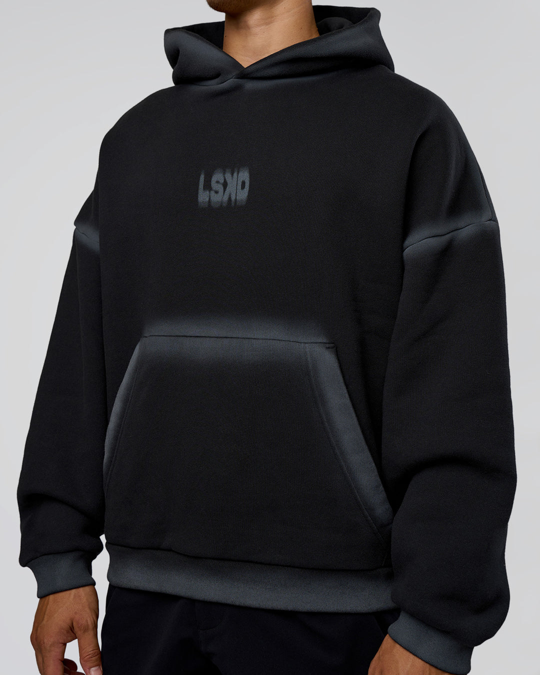 Man wearing Urban Blur Unisex Oversized Hoodie - Black-Dark Storm | Model:Jackson | Size:L