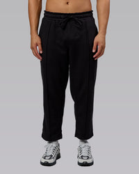 Man wearing Urban Cropped Track Pant - Black| Model:Kaelyb | Size:L