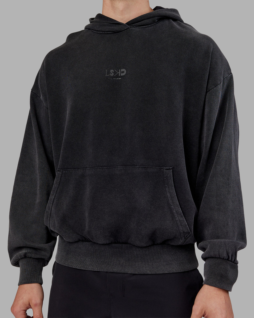 Man wearing Variation Washed Oversized Hoodie - Black-Black | Model:Tom | Size:L