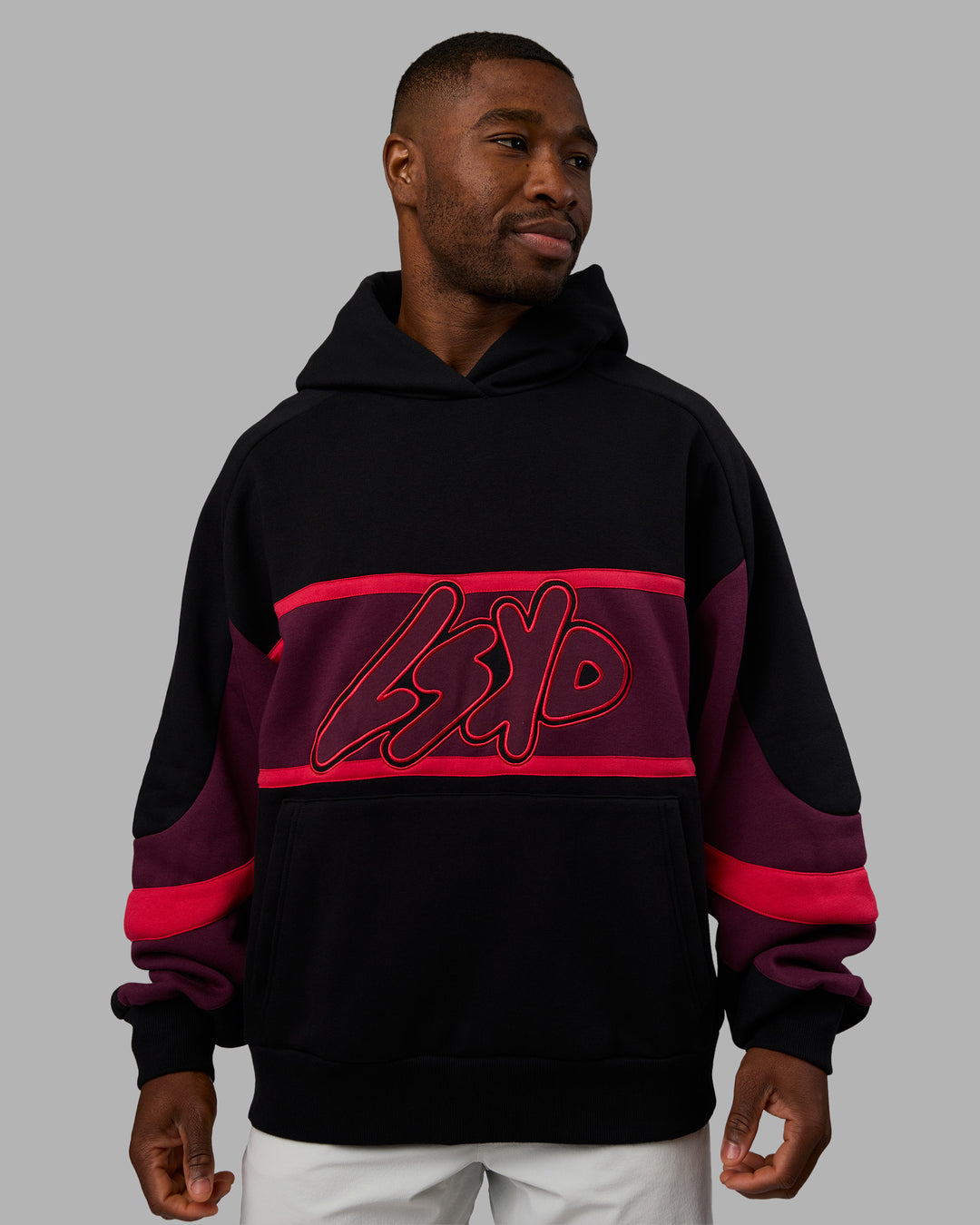 Man wearing Vibe Oversized Unisex Hoodie - Black-Cherry Lacquer | Model:Sam | Size:L - view 3