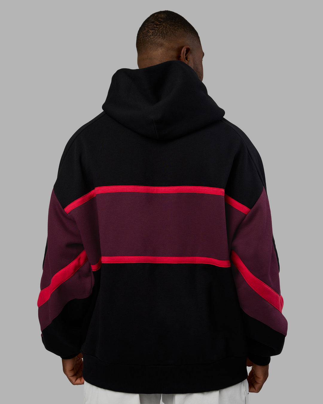 Man wearing Vibe Oversized Unisex Hoodie - Black-Cherry Lacquer | Model:Sam | Size:L - view 4