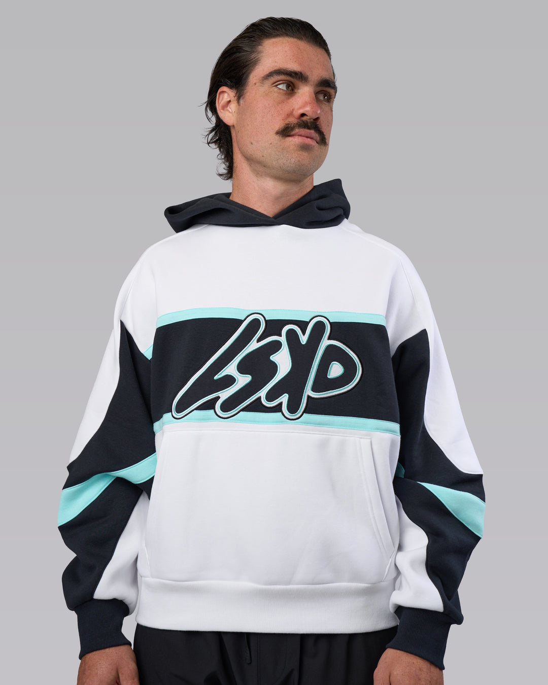 Man wearing Vibe Oversized Unisex Hoodie - White-Island Paradise | Model:Adam | Size:L
