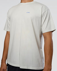 Man wearing We Love This  FLXCotton Oversized Tee - Digital Mist Washed-Electric Indigo | Model:Jackson | Size:L