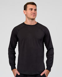 Man wearing Restore CloudFLX Sweater Black | Model:Alex | Size:M