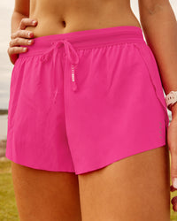 Woman wearing Accelerate 3" Running Short - Ultra Pink | Model:Phoebe | Size:M