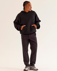 Woman wearing AfterDark ZeroCrease Oversized Hoodie - Black | Model:Loren | Size:XS