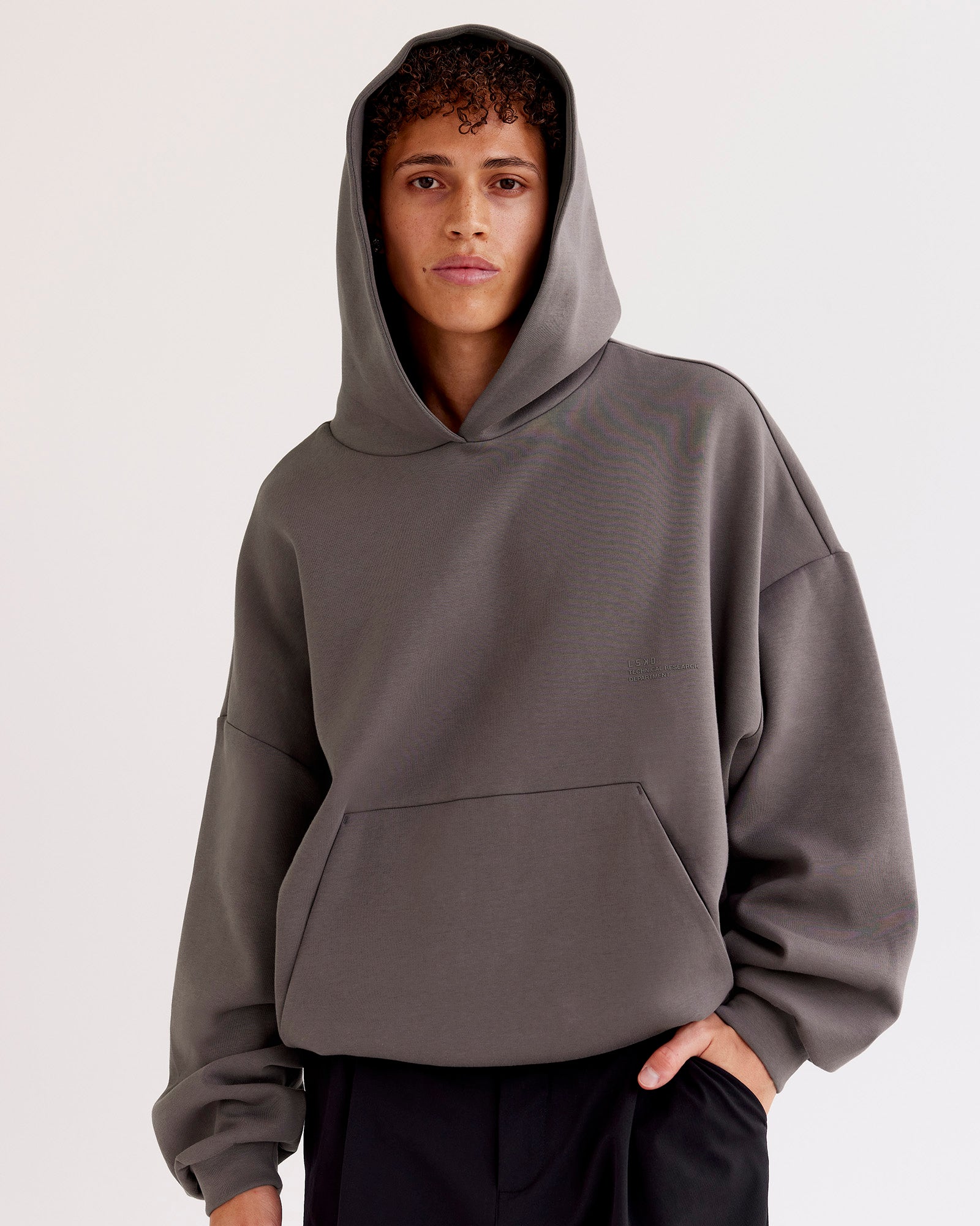 Man wearing AfterDark ZeroCrease Oversized Hoodie - Duskstone | Model:Leandro | Size:M