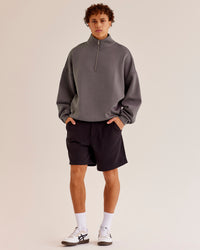 Man wearing AfterDark ZeroCrease Quarter Zip - Duskstone | Model:Leandro | Size:M