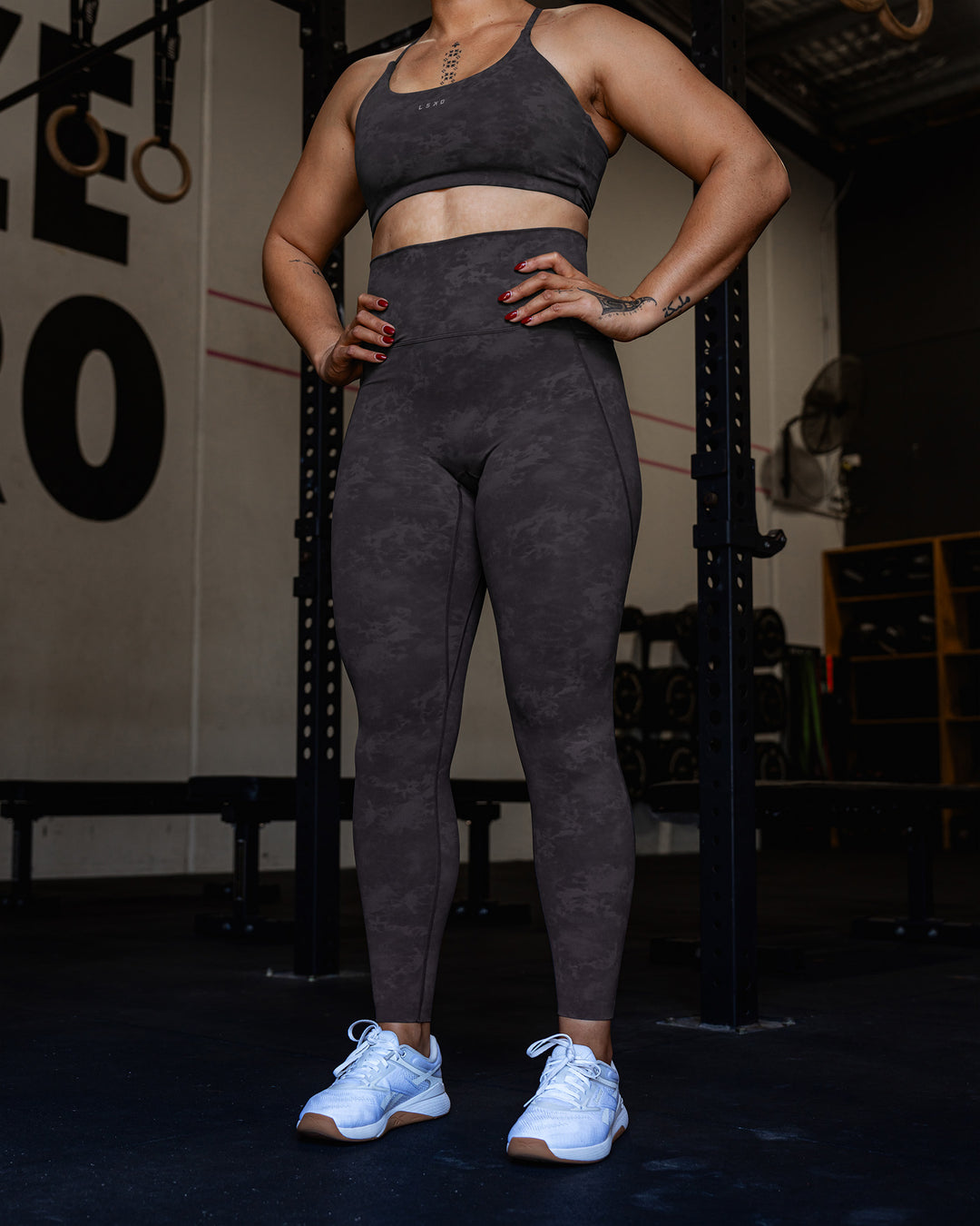 Woman wearing Elixir Ultra High-Rise Full Length Legging Pockets - Dark Storm Wash | Model:Tiare | Size:M