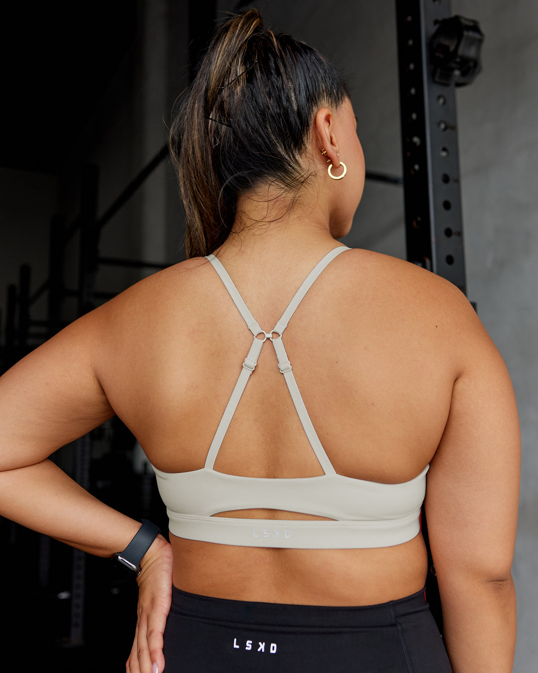 Woman wearing Essence Sports Bra - Shale Beige | Model:Gloria | Size:M