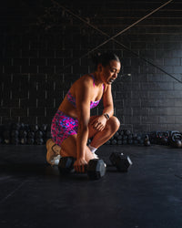 Woman wearing Fusion High-Rise 4" Short Pockets - Pink Luminous | Model:Teraipine | Size:M