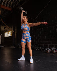 Woman wearing Fusion Ultra High-Rise 6" Short Pockets - Apricot Mist | Model:Tiare | Size:M
