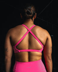 Woman wearing Inspired Sports Bra - Ultra Pink | Model:Tiare | Size:M
